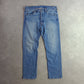Levi's 501 Distressed Medium Wash Jeans
