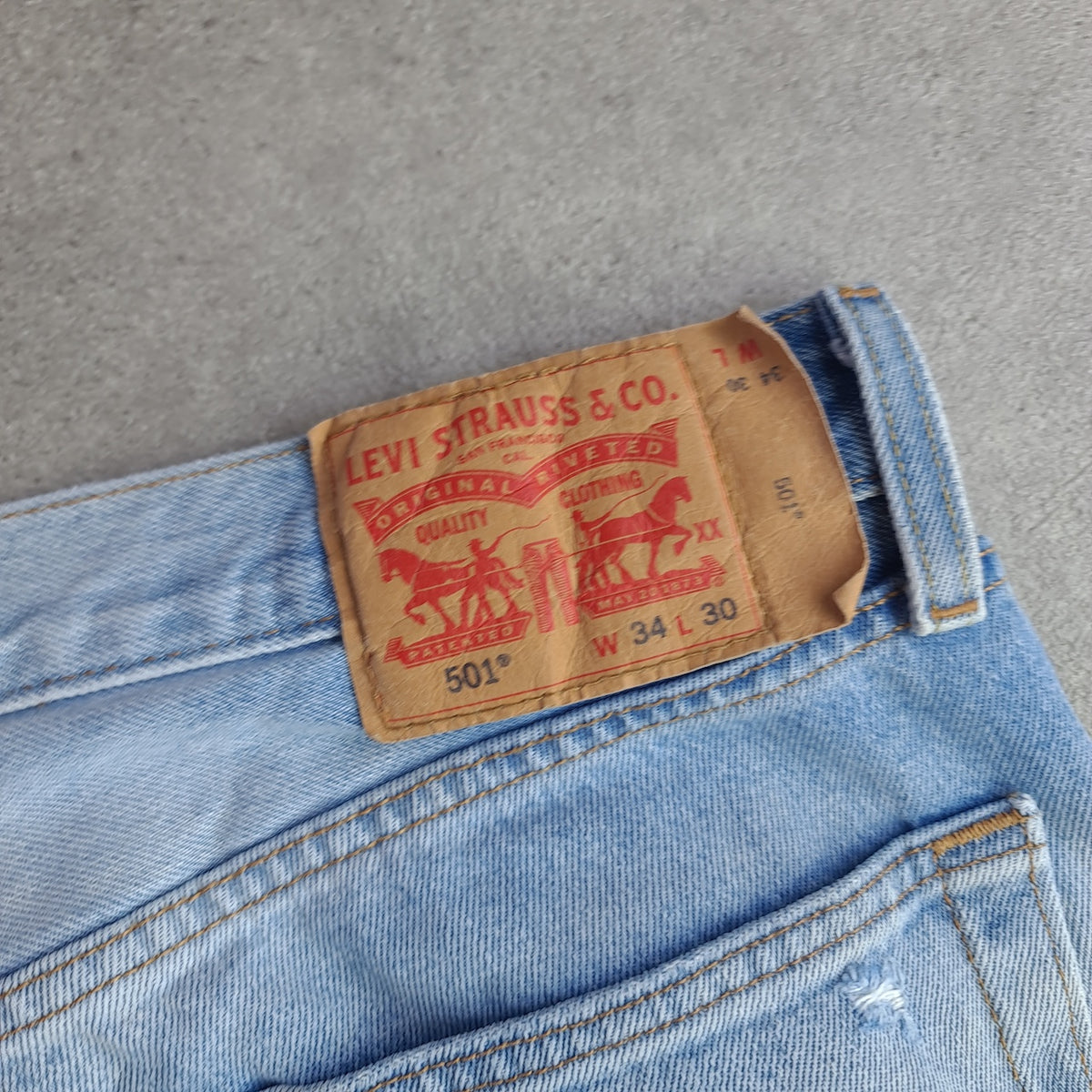 Levi's 501 Light Wash Distressed Ripped Jeans
