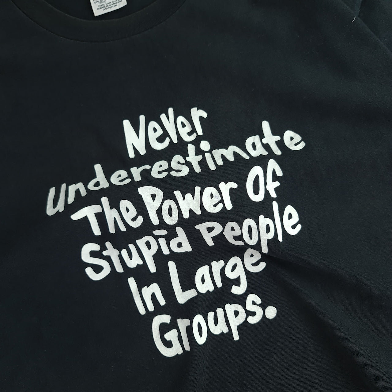 90s Never Underestimate Stupidity Novelty T-Shirt