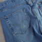 Levi's 501 Distressed Medium Wash Jeans